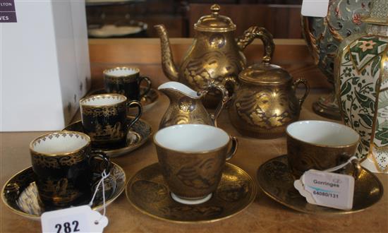 Japanese 8 piece black and gilt part tea set